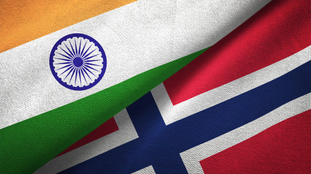 Norway and India two flags together textile cloth fabric texture